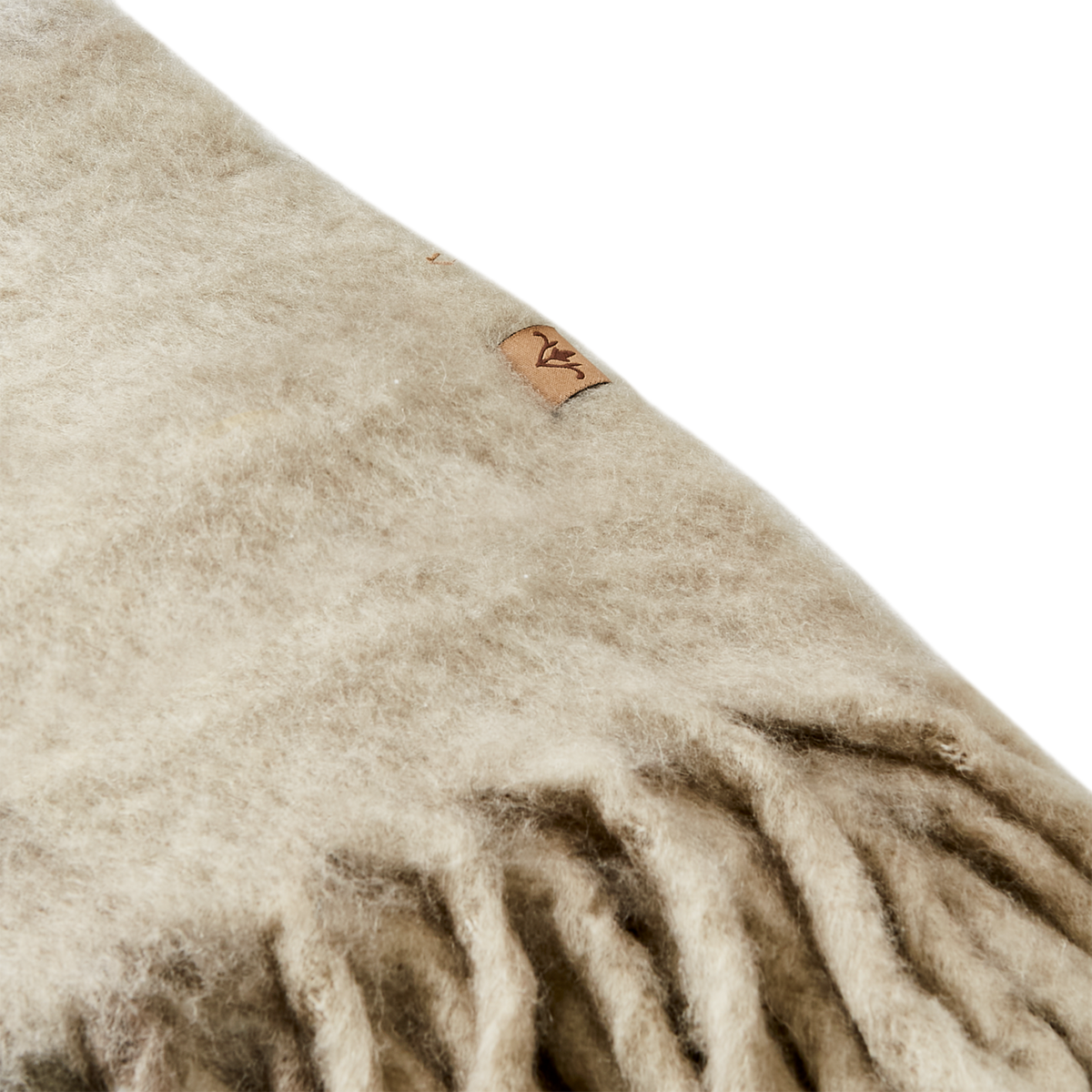 Produktdetalj av ullblandningen på FRASSE filt beige grå grön