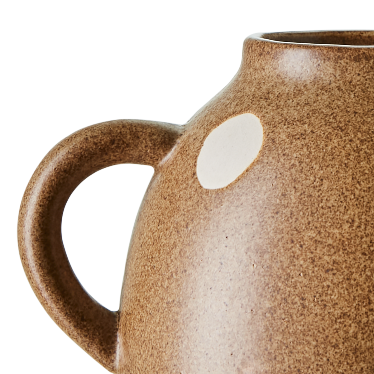 Sidan av DOT urna i beige med vita prickar och handtag