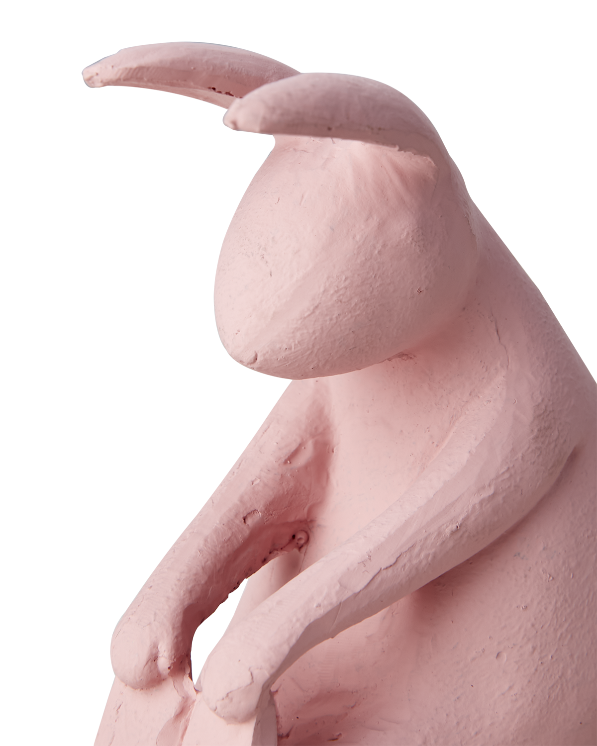 YOGA kanin rosa i polyresin sedd från sidan