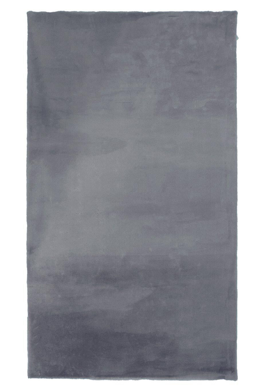 Mjukt tuftad Ninha matta i färgen denim sedd ovanifrån i storlek 80x140 cm