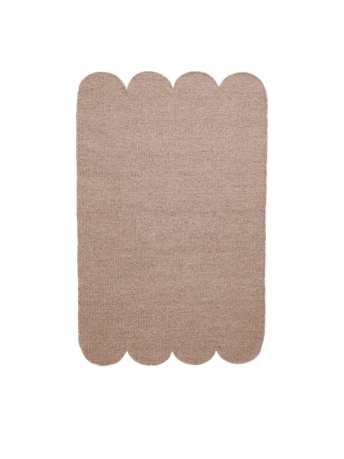 Fia ullmatta beige 60x90 cm med snäckskalsformade kortsidor sedd uppifrån