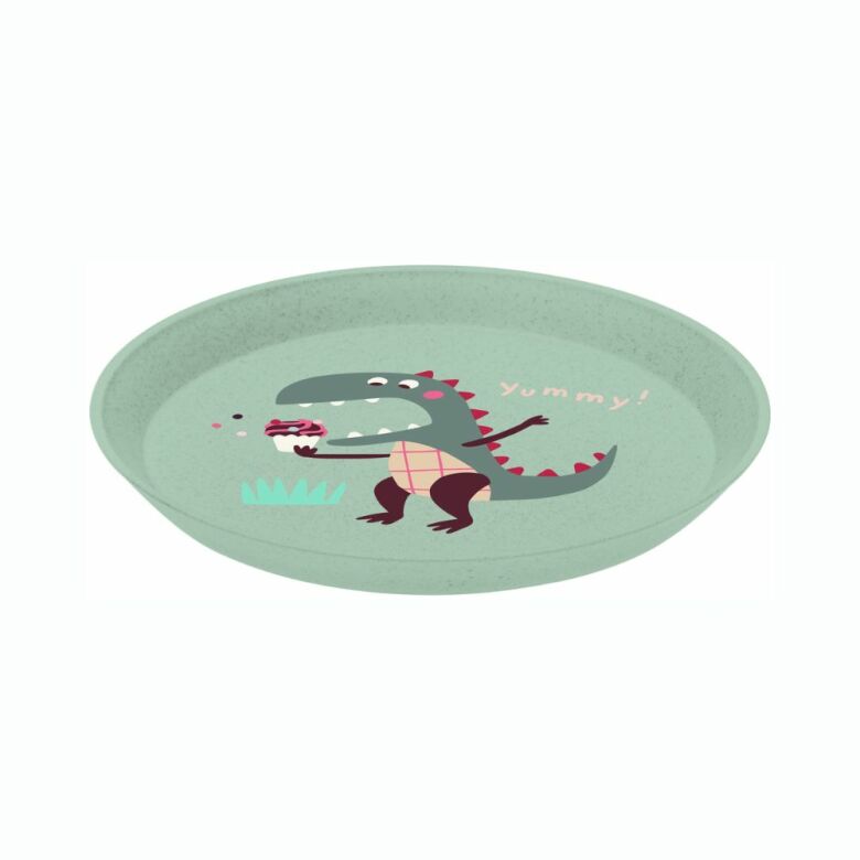 Närbild på miljövänlig Connect barnservis med dinosauriemönster
