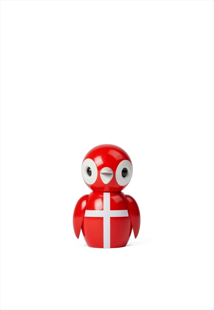Röd träfågel Danish Dynamite i bok med dansk flagga för fritidshuset