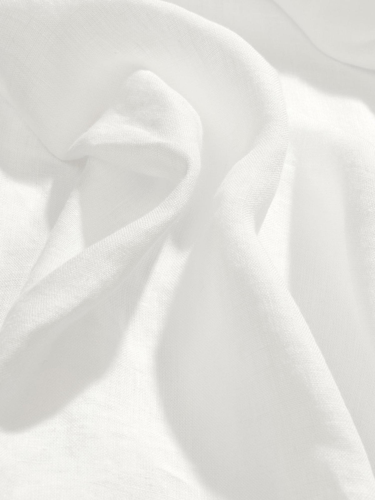 Närbild på texturen av Julie duk i offwhite linne