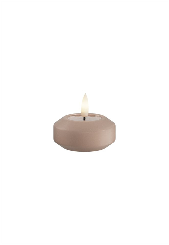 Rosa LED-flytande värmeljus från DeluxeHomeart med naturtrogen låga